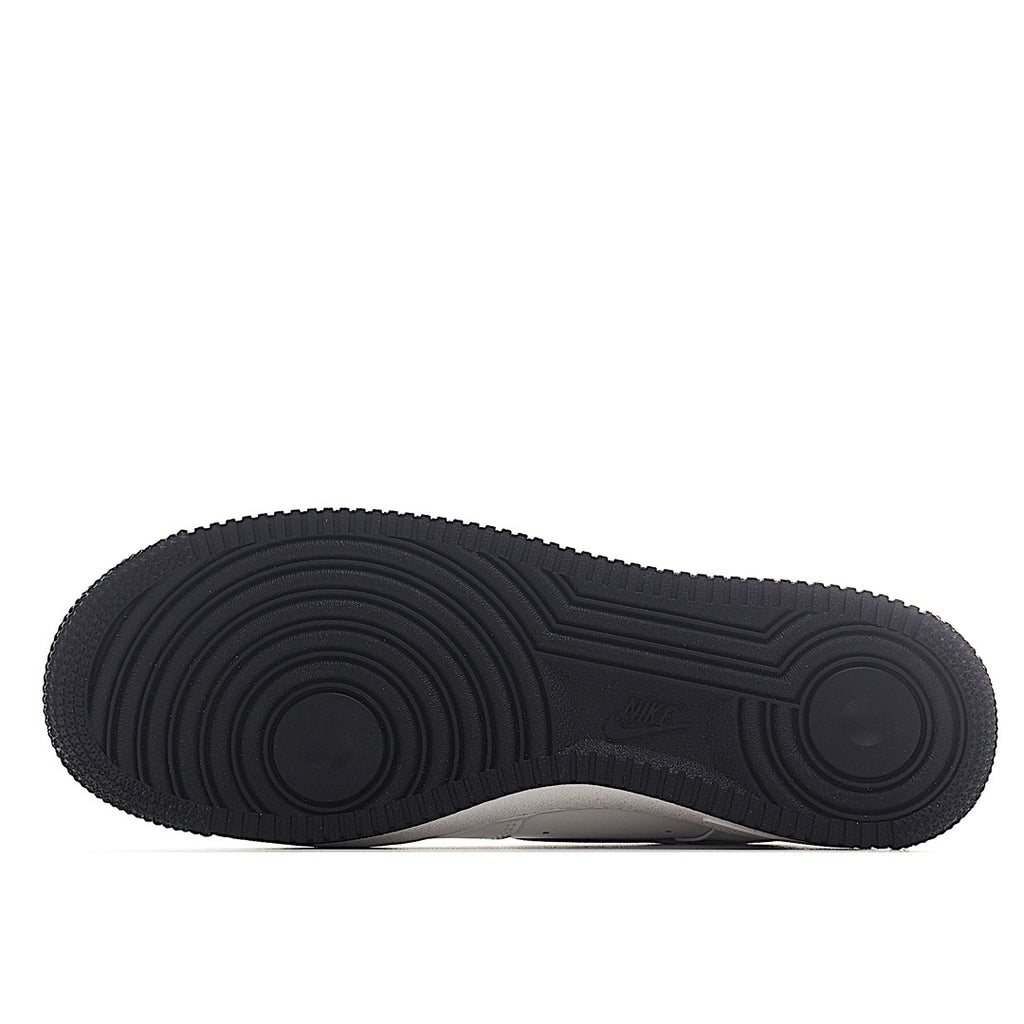 Black rubber outsole for low-top sneaker with circular tread pattern