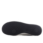 Black rubber outsole for low-top sneaker with circular tread pattern