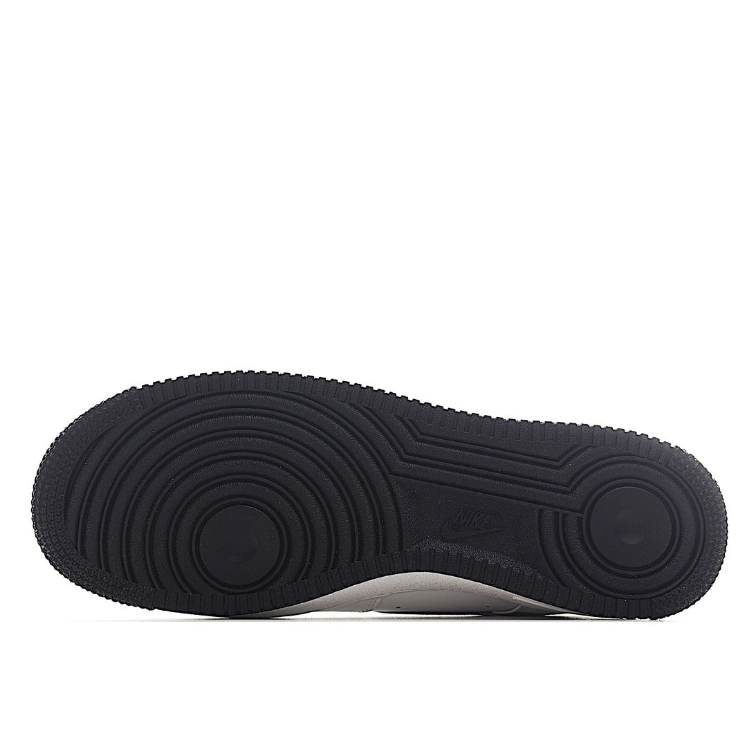 Black rubber outsole for low-top sneaker with circular tread pattern
