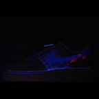 Air Force 1 sneaker, dark blue with lace-up front and 'JUST' accent stitching