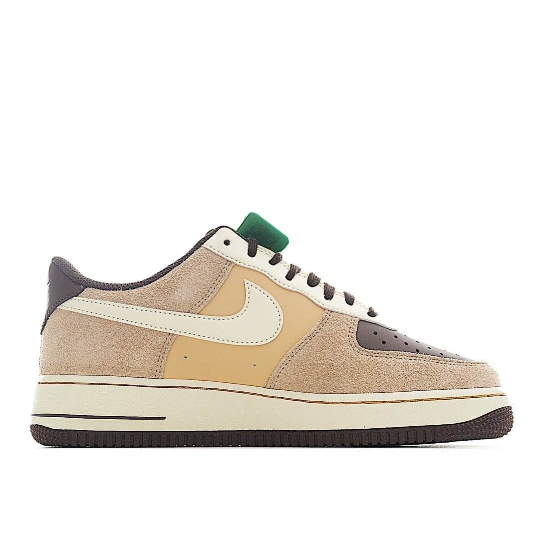 Nike Air Force 1 low-top sneakers in tan with cream swoosh and green lace tab