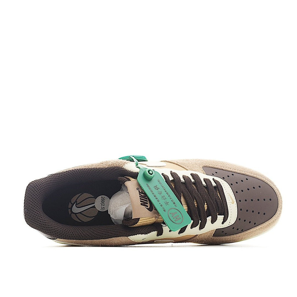 Tan suede Nike sneaker open view with dark lining, green lace tie, white midsole