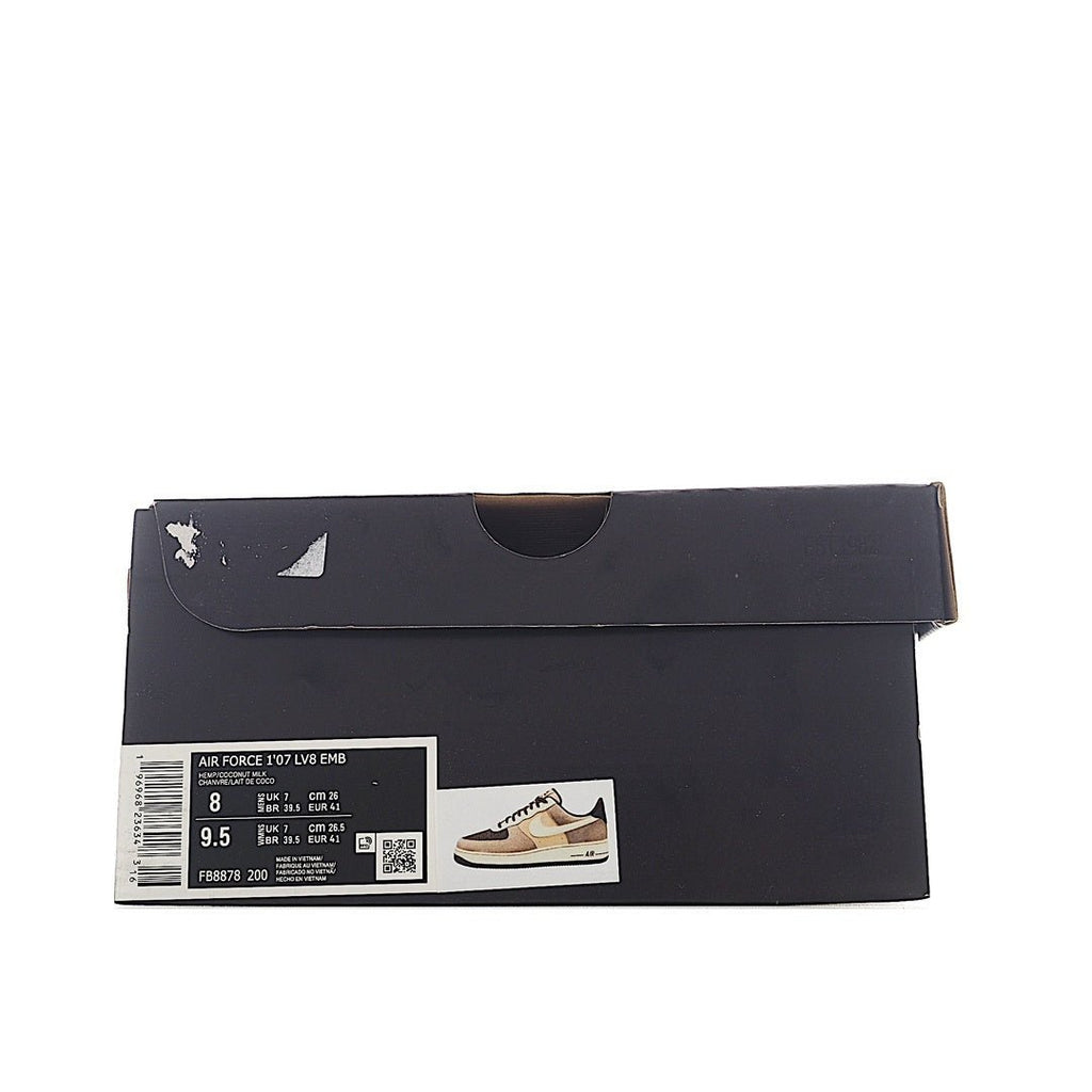 Sneaker shoe box with black design, barcode label, and small shoe image