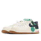 Nike Air Force 1 low-top sneakers, white upper with green plaid panel and gum sole