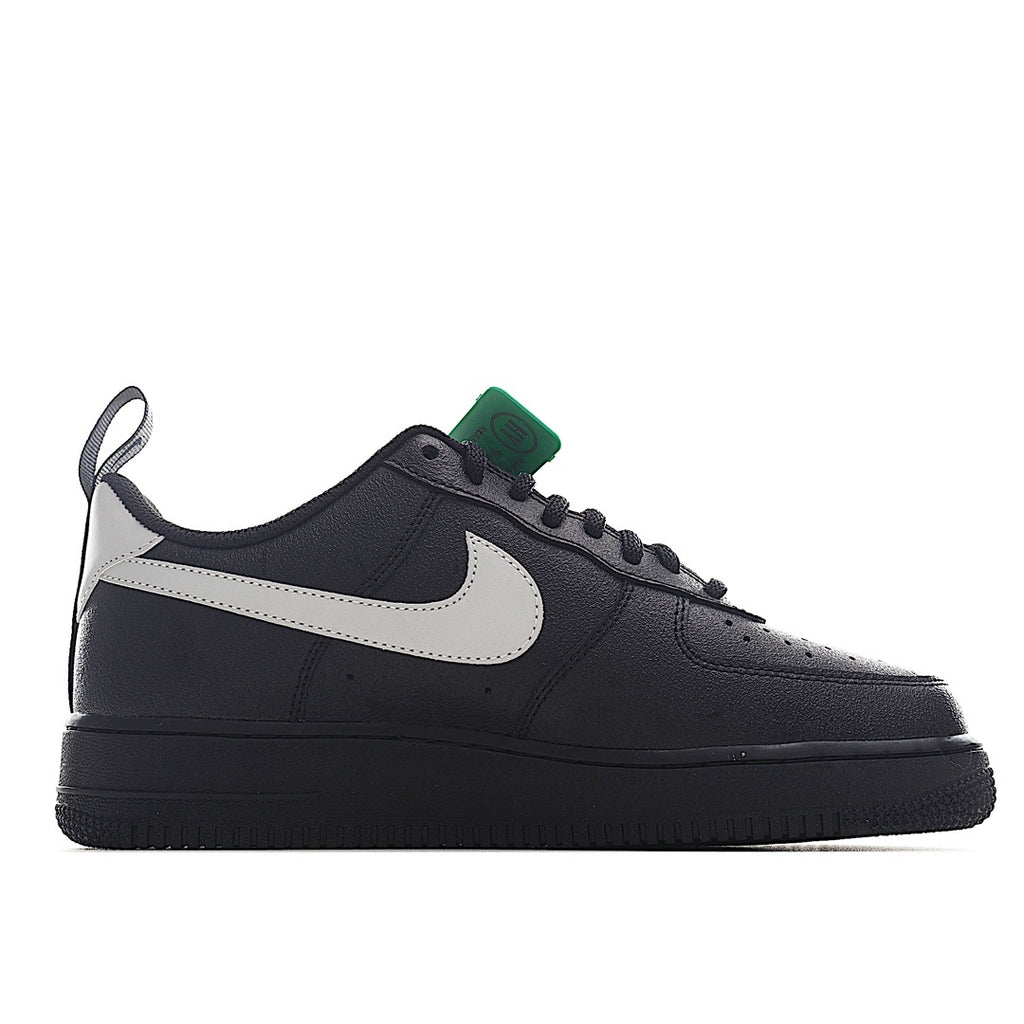 Nike Air Force 1 low-top sneakers, black upper with white strap and white swoosh