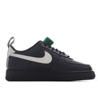 Nike Air Force 1 low-top sneakers, black upper with white strap and white swoosh