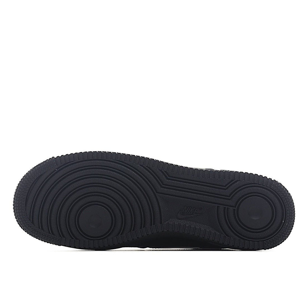 Nike Air Force 1 low-top sneakers, black outsole with circular tread pattern