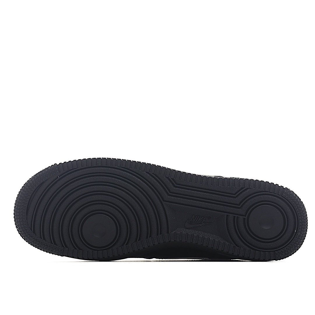 Nike Air Force 1 low-top sneakers, black outsole with circular tread pattern