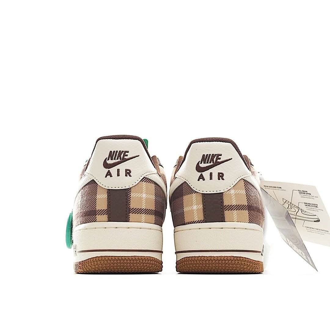 Pair of low-top sneakers with rear Nike Air lettering, plaid heel panels, gum sole