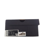 Black shoe box with product sticker and barcode