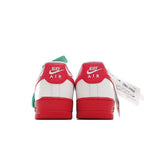 Low-top sneaker, white upper with red swoosh, green heel tag, red sole