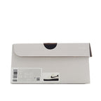 Sneaker box, light gray with Nike logo and barcode size label.