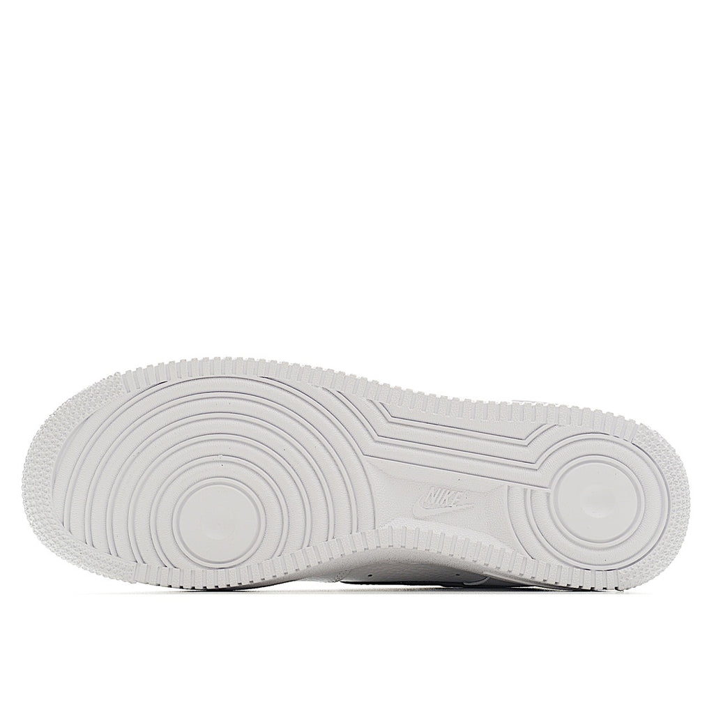 White rubber outsole for a low-top sneaker with circular tread pattern