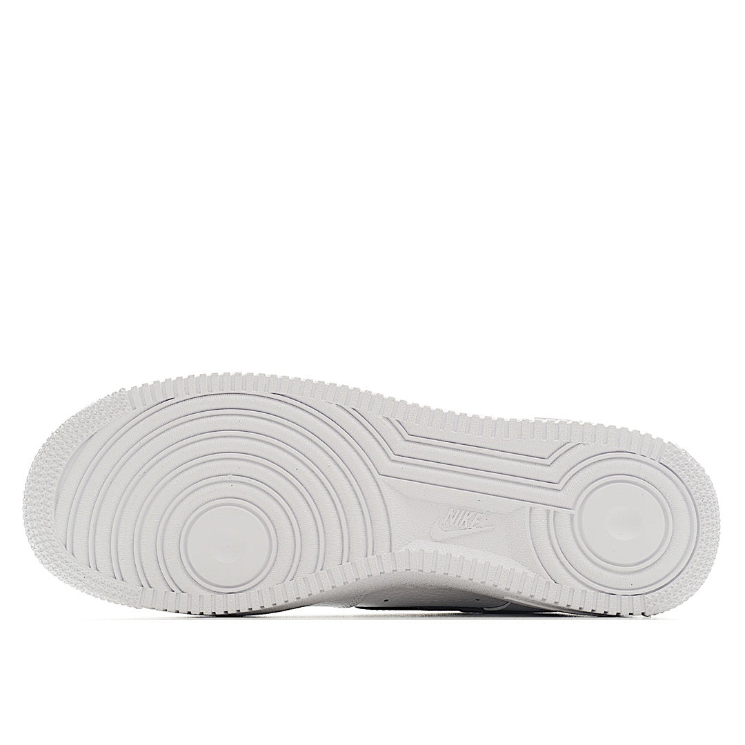 White rubber outsole for a low-top sneaker with circular tread pattern