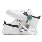 White leather sneaker with black swoosh, green tag, and visible side lace holes