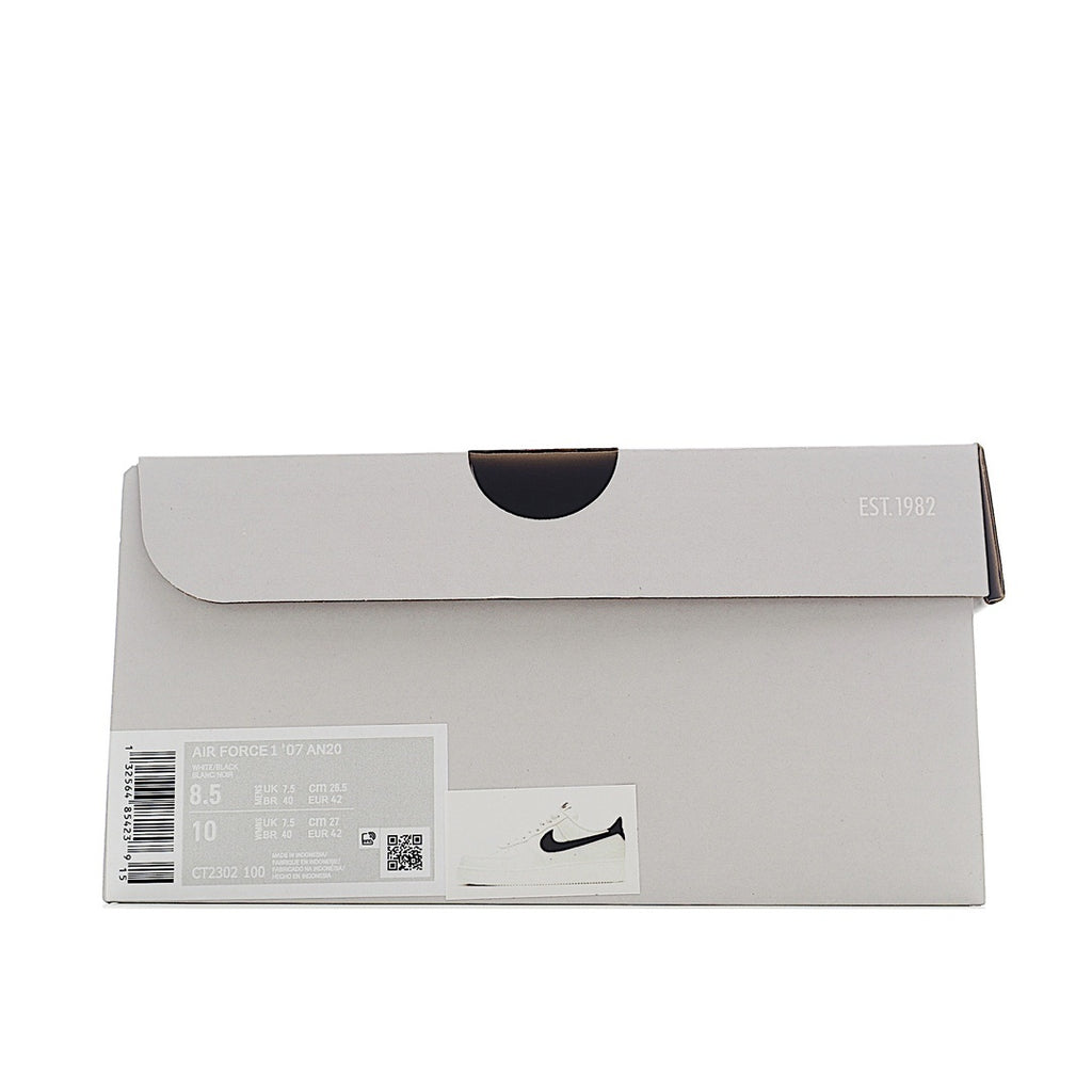 Light gray shoebox with black swoosh on the front