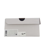 Light gray shoebox with black swoosh on the front