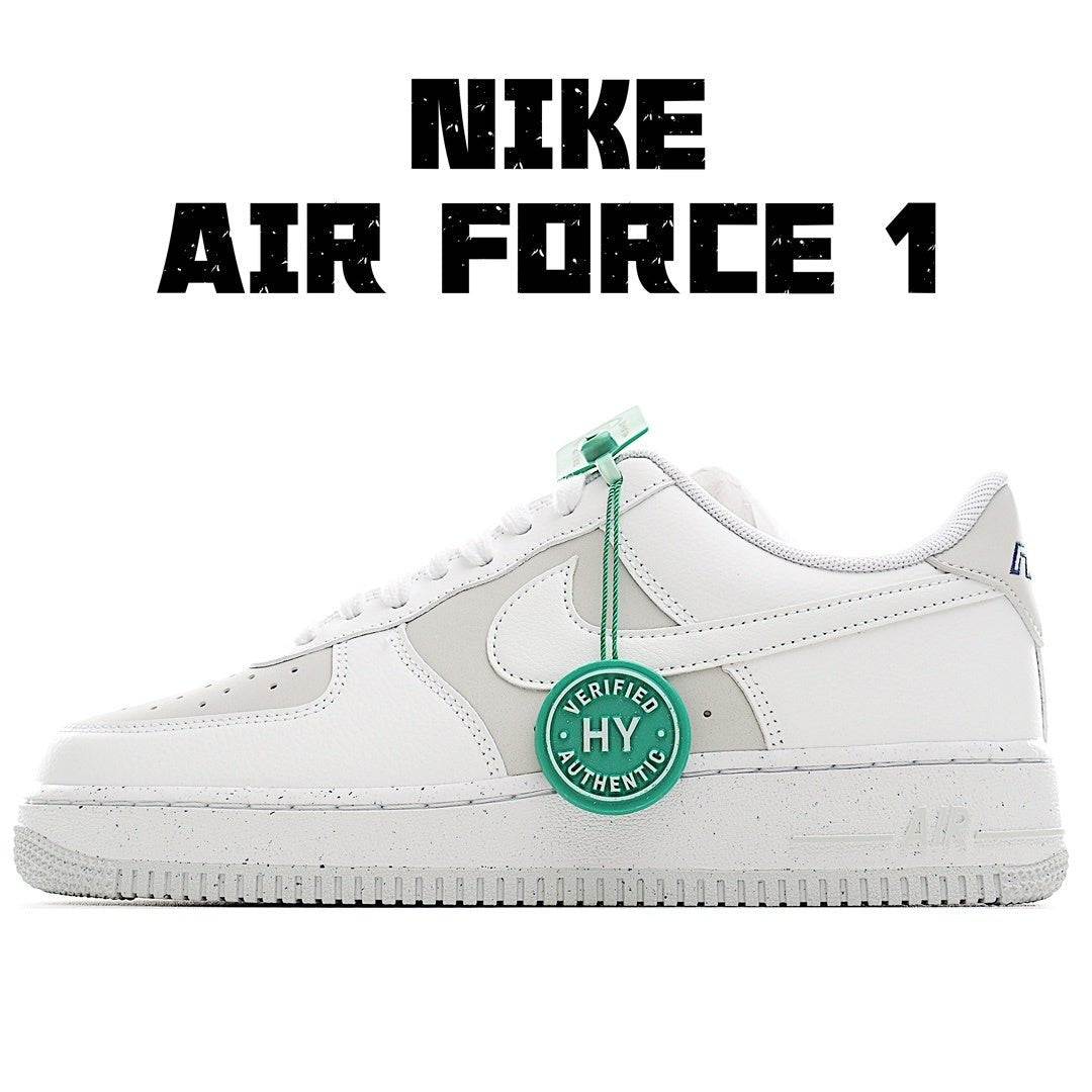 Nike Air Force 1 low-top sneakers, white leather with green lace