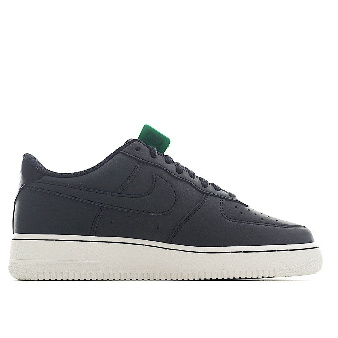 Nike Air Force 1 low-top sneaker, dark upper with green pull tab and white midsole