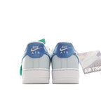 Light blue Nike Air Force 1 sneakers with NIKE AIR heel branding and mint accents