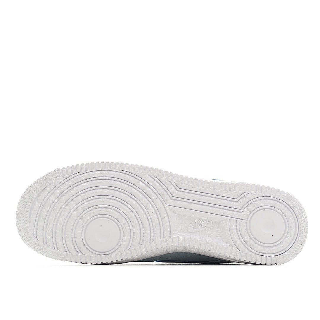 White Nike Air Force 1 outsole view with tread and circular heel detail