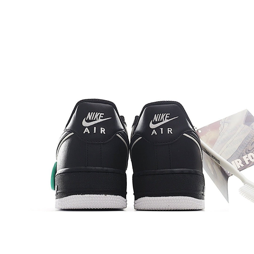 Nike Air Force 1 sneakers, black heels with NIKE AIR text and teal pull tab.