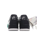 Nike Air Force 1 sneakers, black heels with NIKE AIR text and teal pull tab.