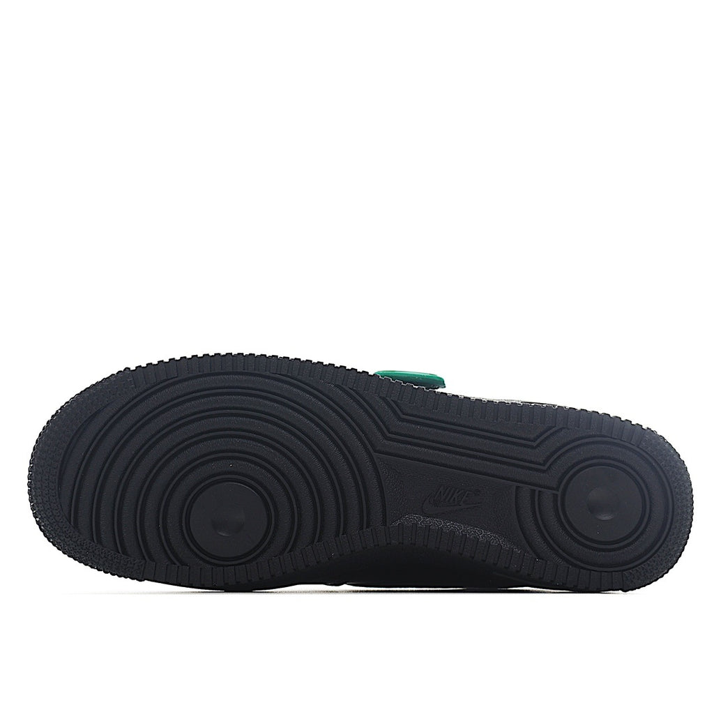 Shoe outsole view with dark tread and textured grip pattern