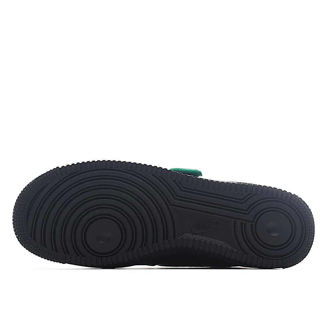 Shoe outsole view with dark tread and textured grip pattern