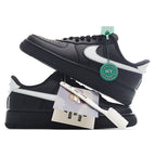 Low-top sneakers with black uppers, white swoosh, and green HY verification tag