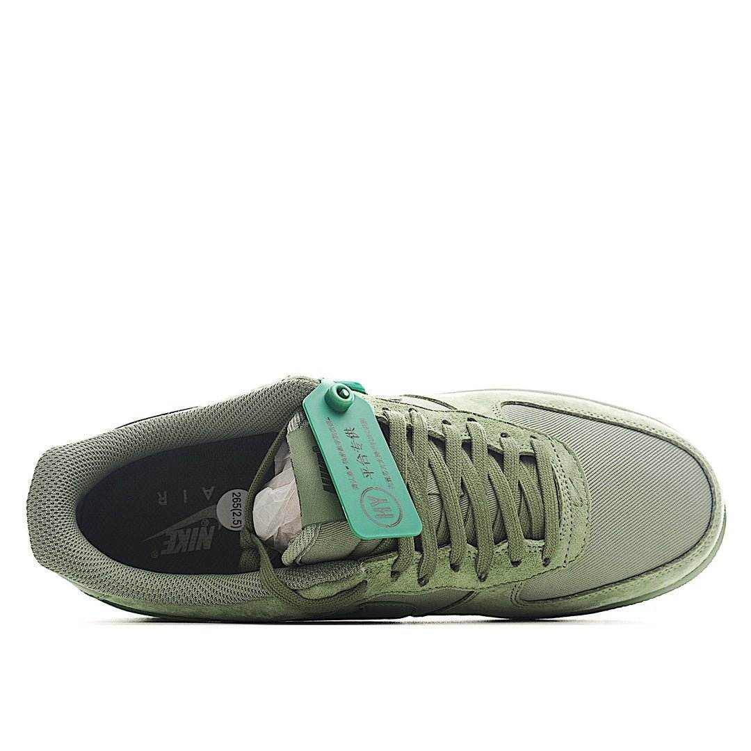 Nike Air Force 1 low-top sneakers, light green suede with green collar lining and laces
