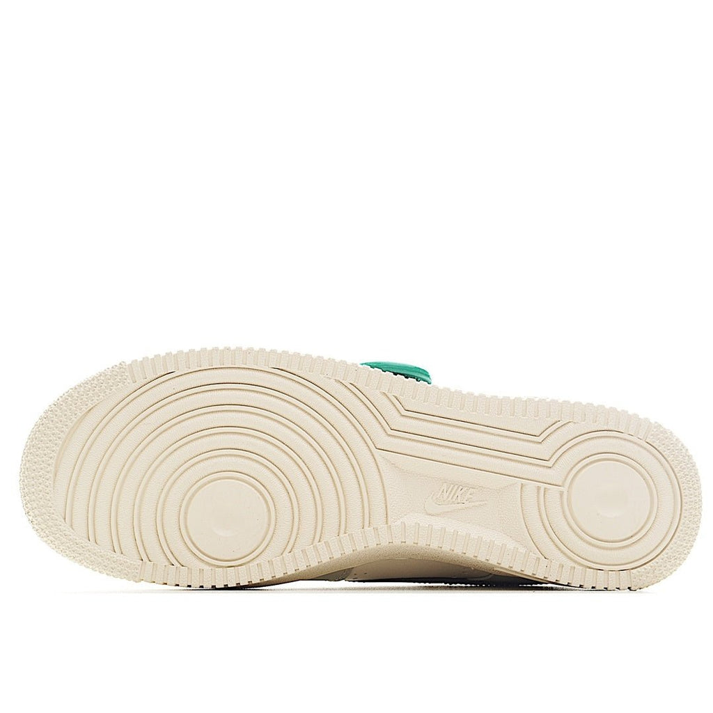 Nike Air Force 1 rubber outsole with circular traction pattern in light color