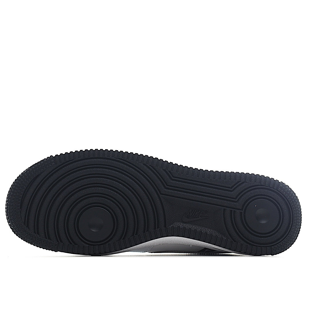 Black Nike Air Force 1 rubber outsole with deep tread pattern.