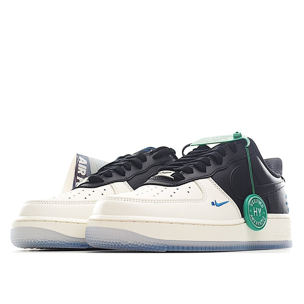 Nike Air Force 1 low sneakers, side view; black and white leather with blue swoosh, green accents