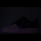 Nike Air Force 1 sneakers, dark silhouette with blue details and light sole