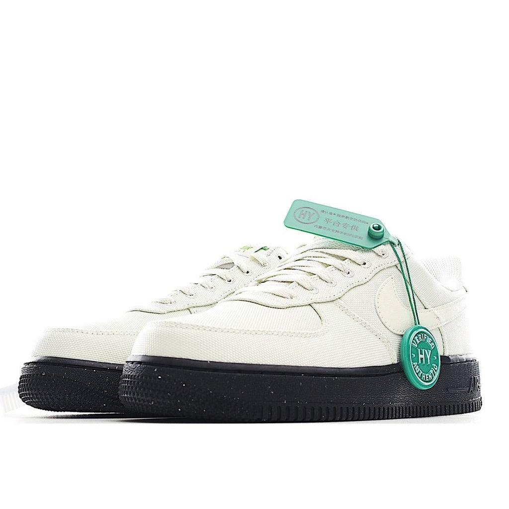 White sneaker side view with teal tag and black rubber sole