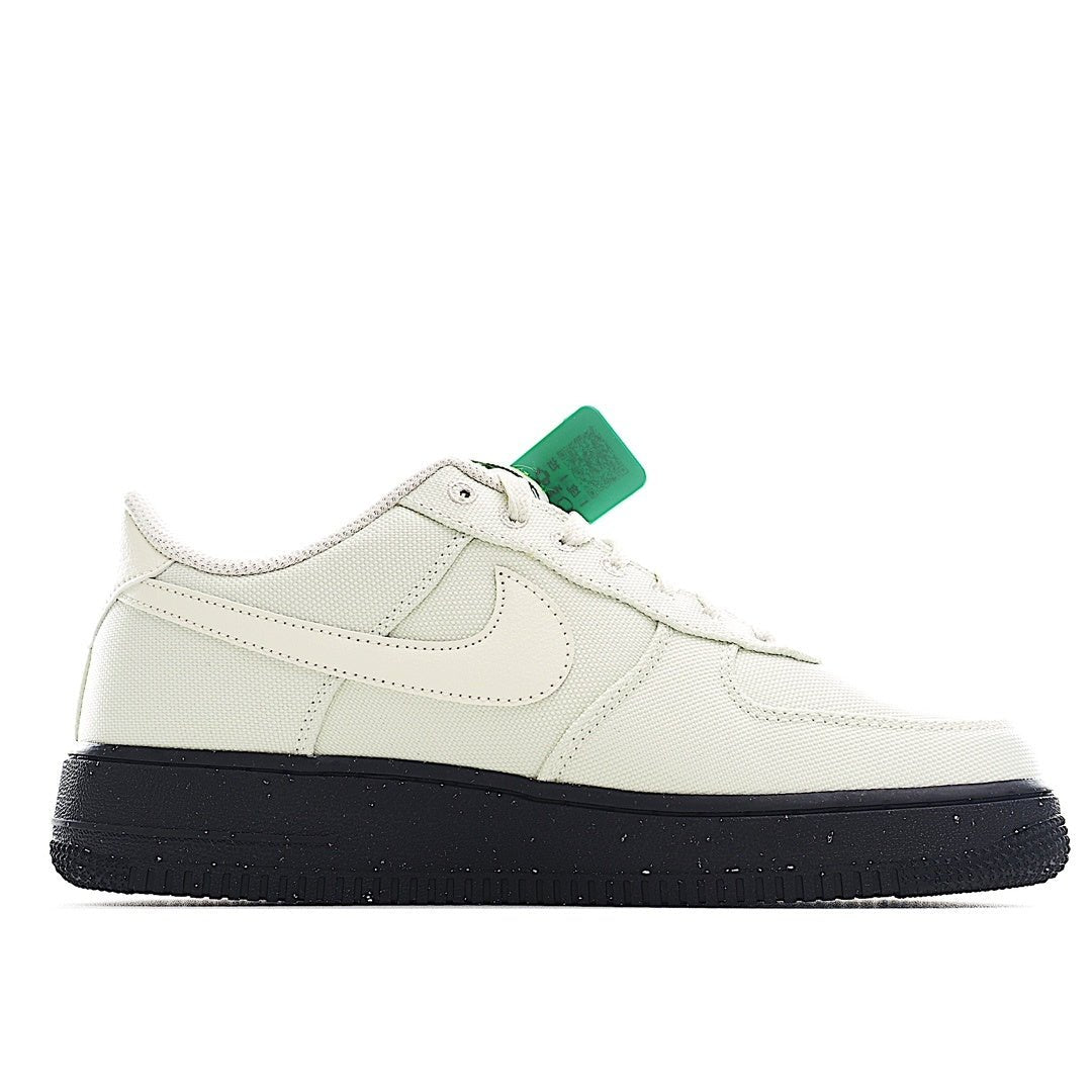White low-top sneaker with teal hang tag and black outsole