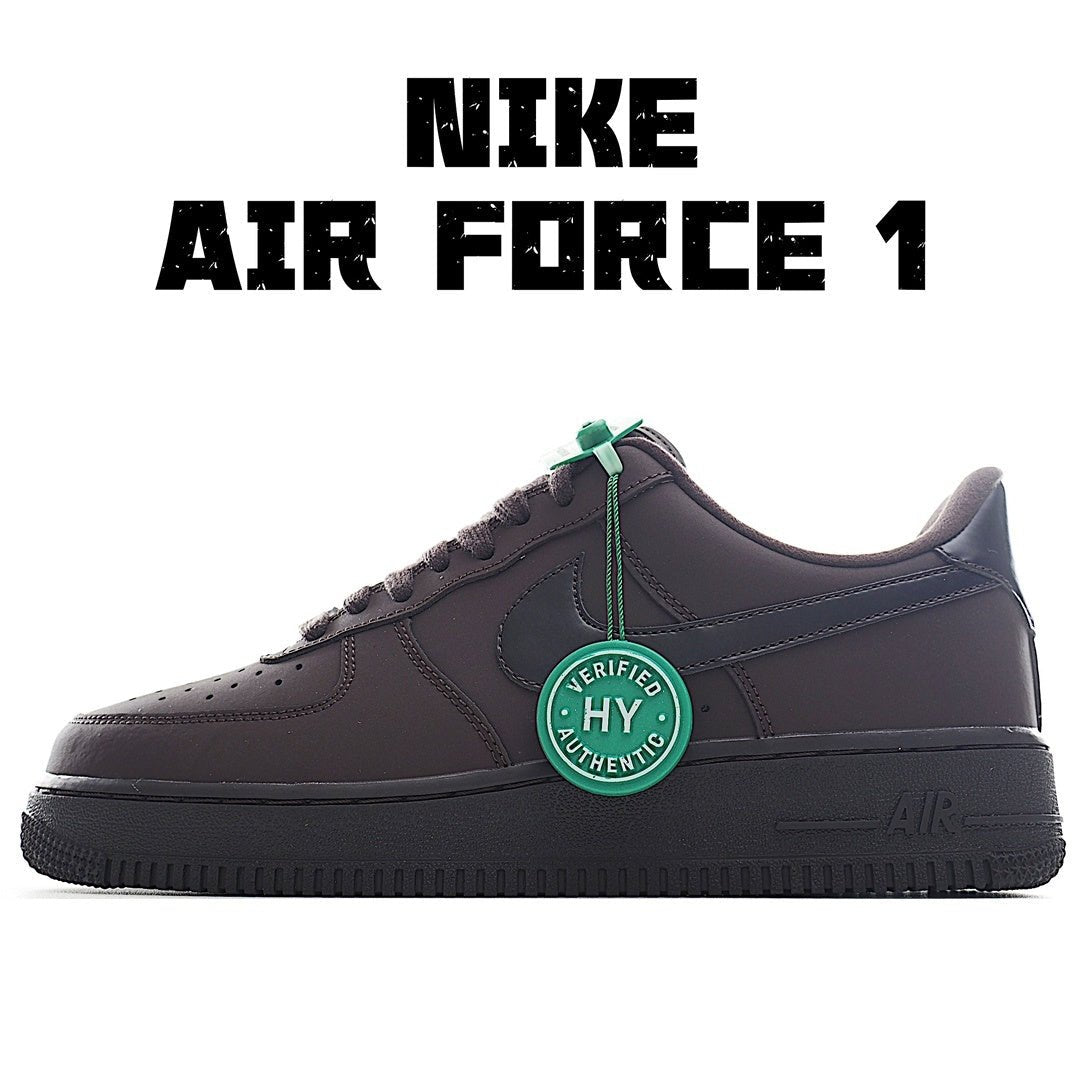 Nike Air Force 1 sneakers, dark upper with green verification badge at lace area.