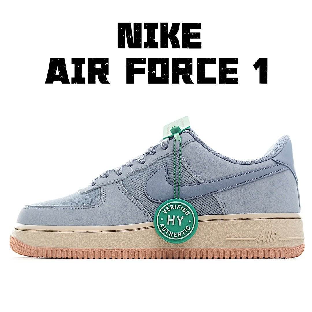 Nike Air Force 1 low-top sneakers in light blue with green accents and gum sole