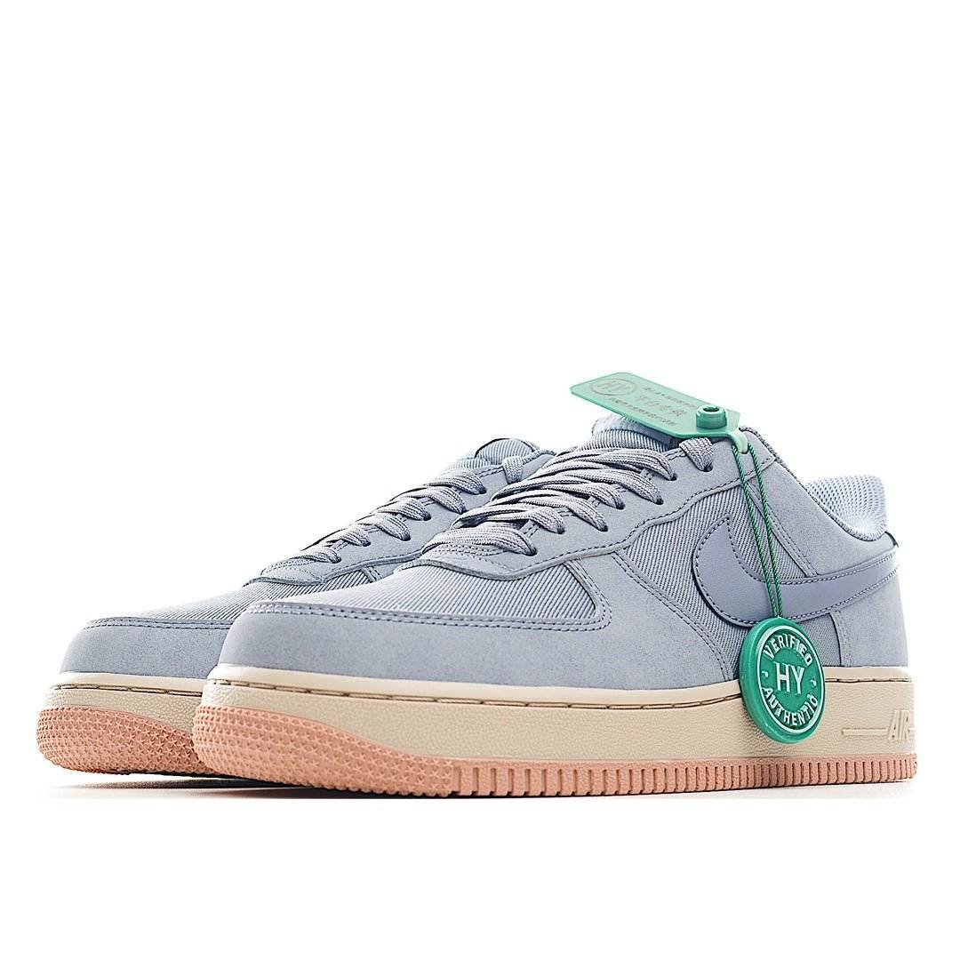 Nike Air Force 1 low-top sneakers, light blue uppers with green heel tag and gum sole