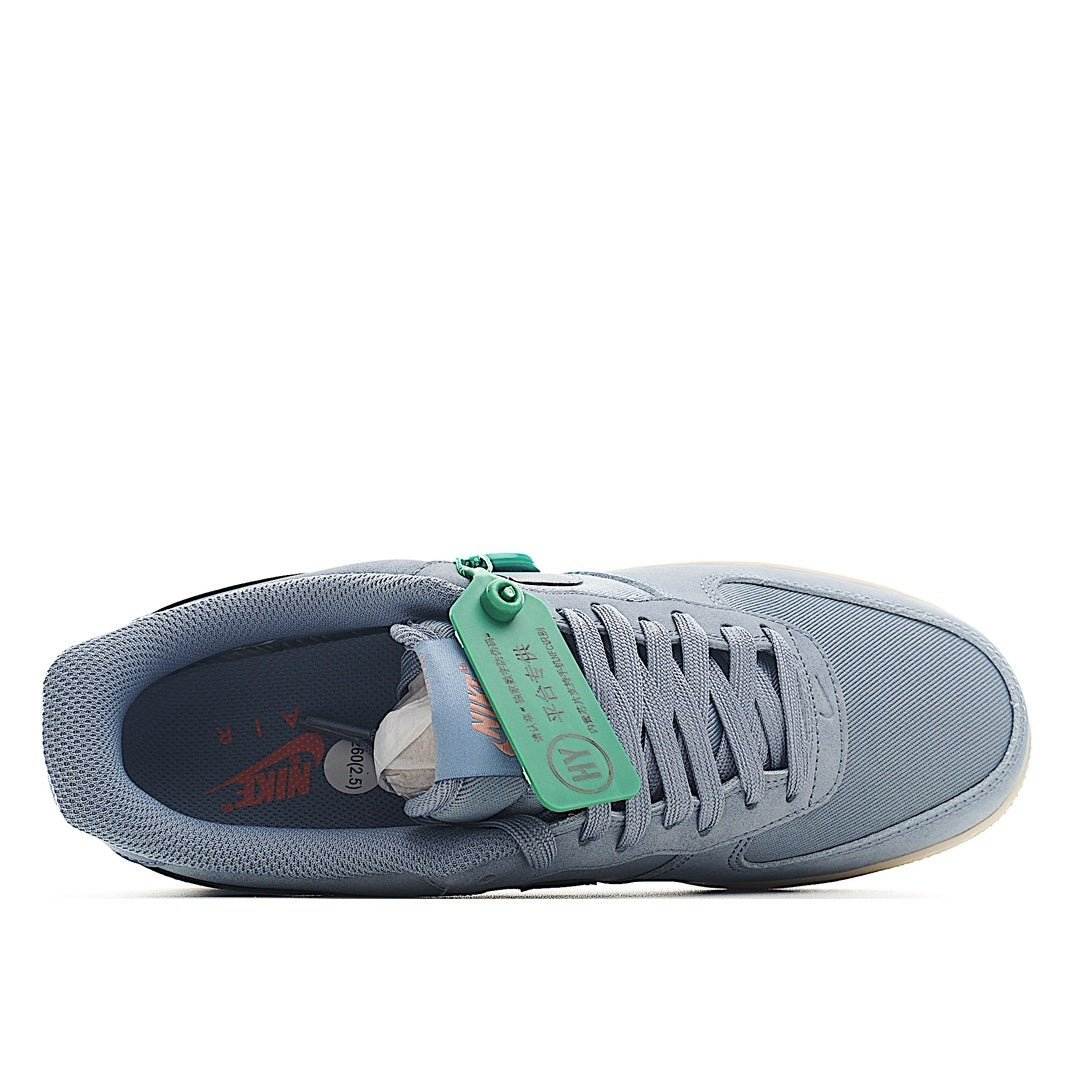 Nike Air Force 1 low-top sneakers interior view with light blue lining and green lace tag