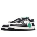 Side view black and white Air Force 1 low-top sneakers with green authenticity seal