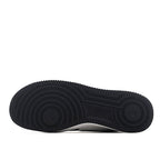 Black rubber outsole with circular tread pattern for Air Force 1 sneakers