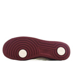 Burgundy outsole with circular traction pattern for Air Force 1 sneakers