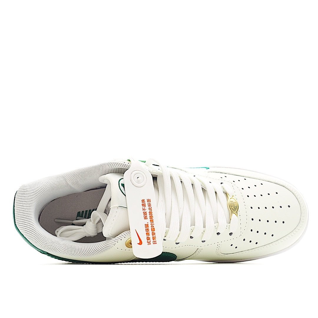 White low-top sneakers with green-trim collar and lace-up opening