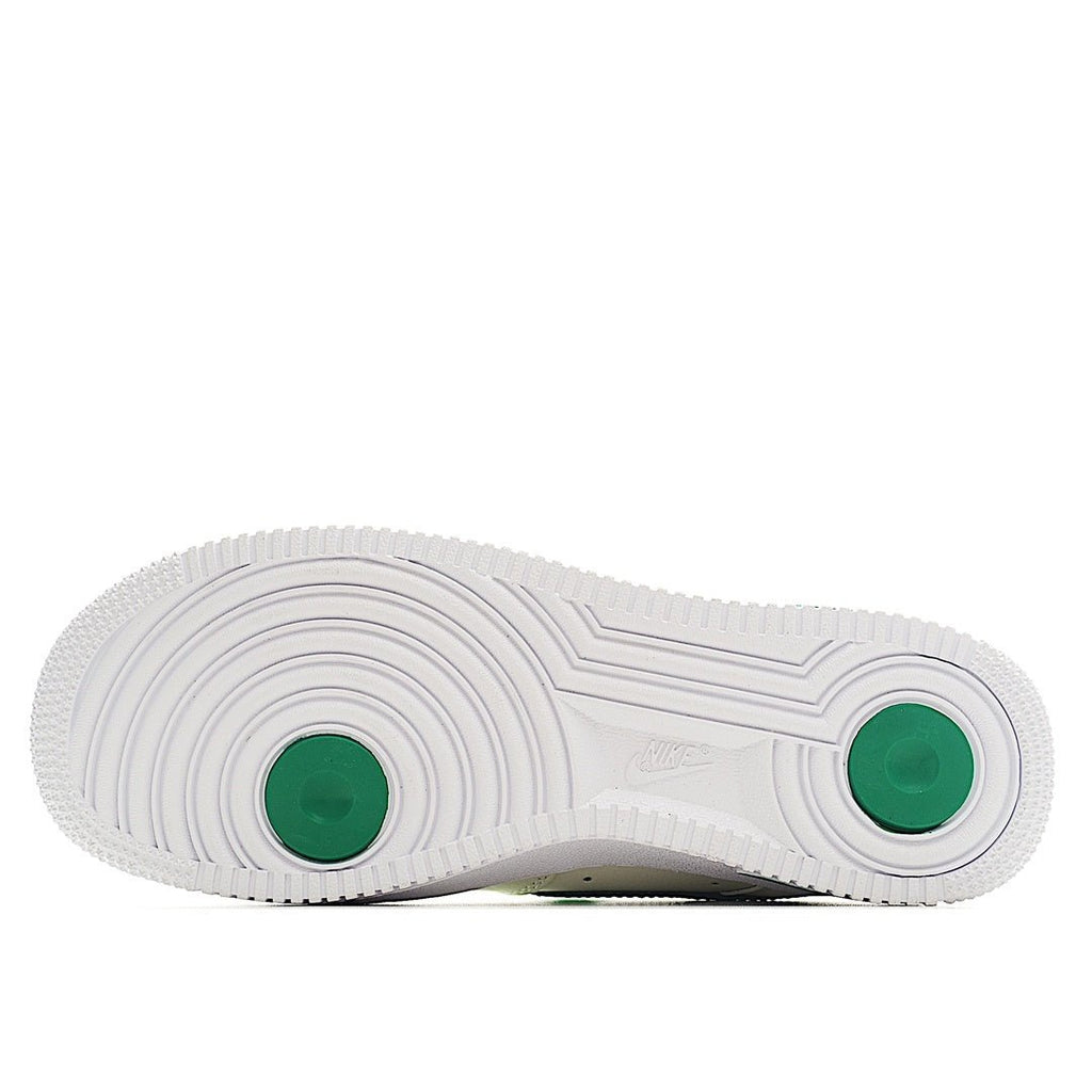 White rubber outsole with green circular traction pods