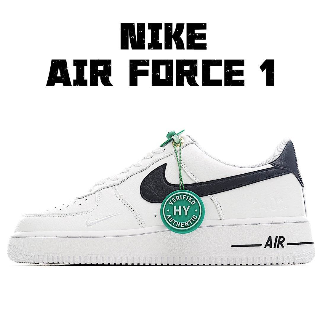 Nike Air Force 1 sneakers, white with navy swoosh, green lace tag, side view