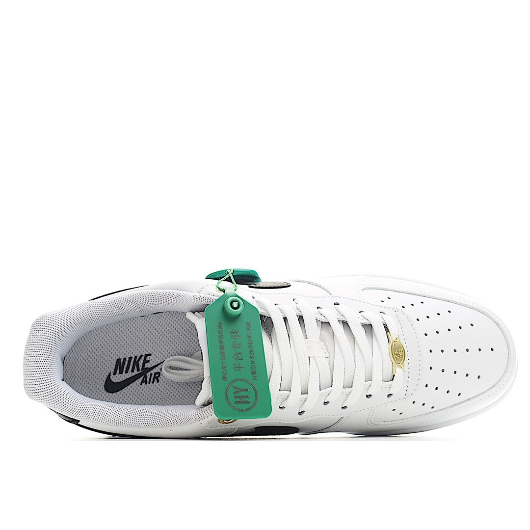 White leather sneaker with lace-up front, black swoosh, and green hang tag