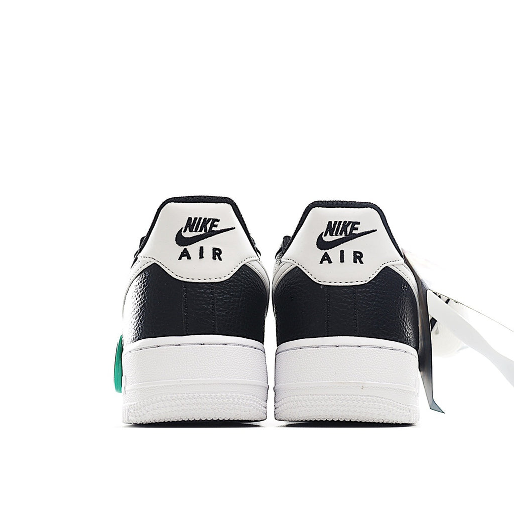 Nike Air Force 1 low-top heels, black/navy with white panels and Nike Air branding