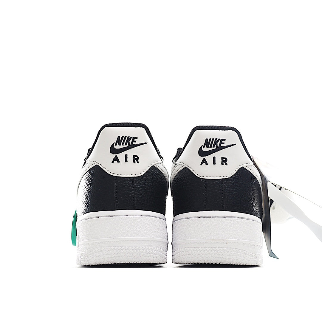 Nike Air Force 1 low-top heels, black/navy with white panels and Nike Air branding